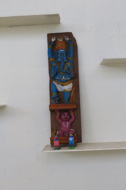 Lord Ganesh Engraved in Wooden Plank