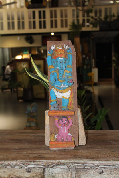 Lord Ganesh Engraved in Wooden Plank